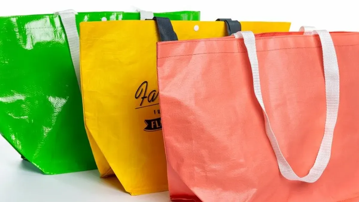 Green, yellow, and coral woven polypropylene tote bags