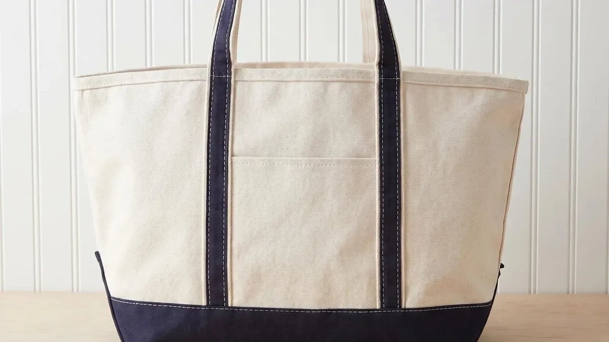 Natural canvas zip top tote bag with navy trim