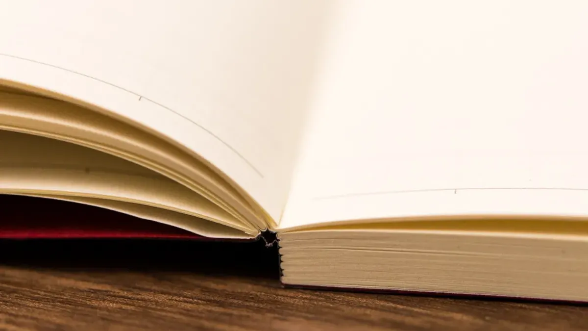 Lay flat softcover notebook opened fully flat on a desk