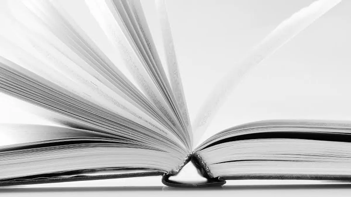 Perfect bound softcover notebook with a glued square spine