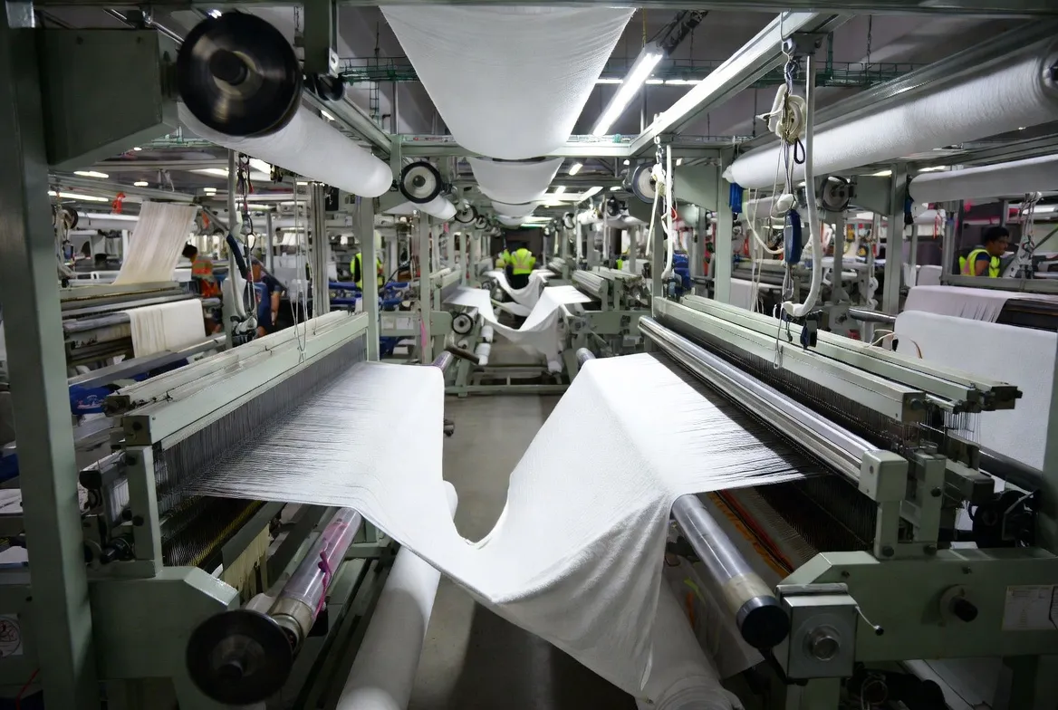 Towel production line with commercial looms in operation
